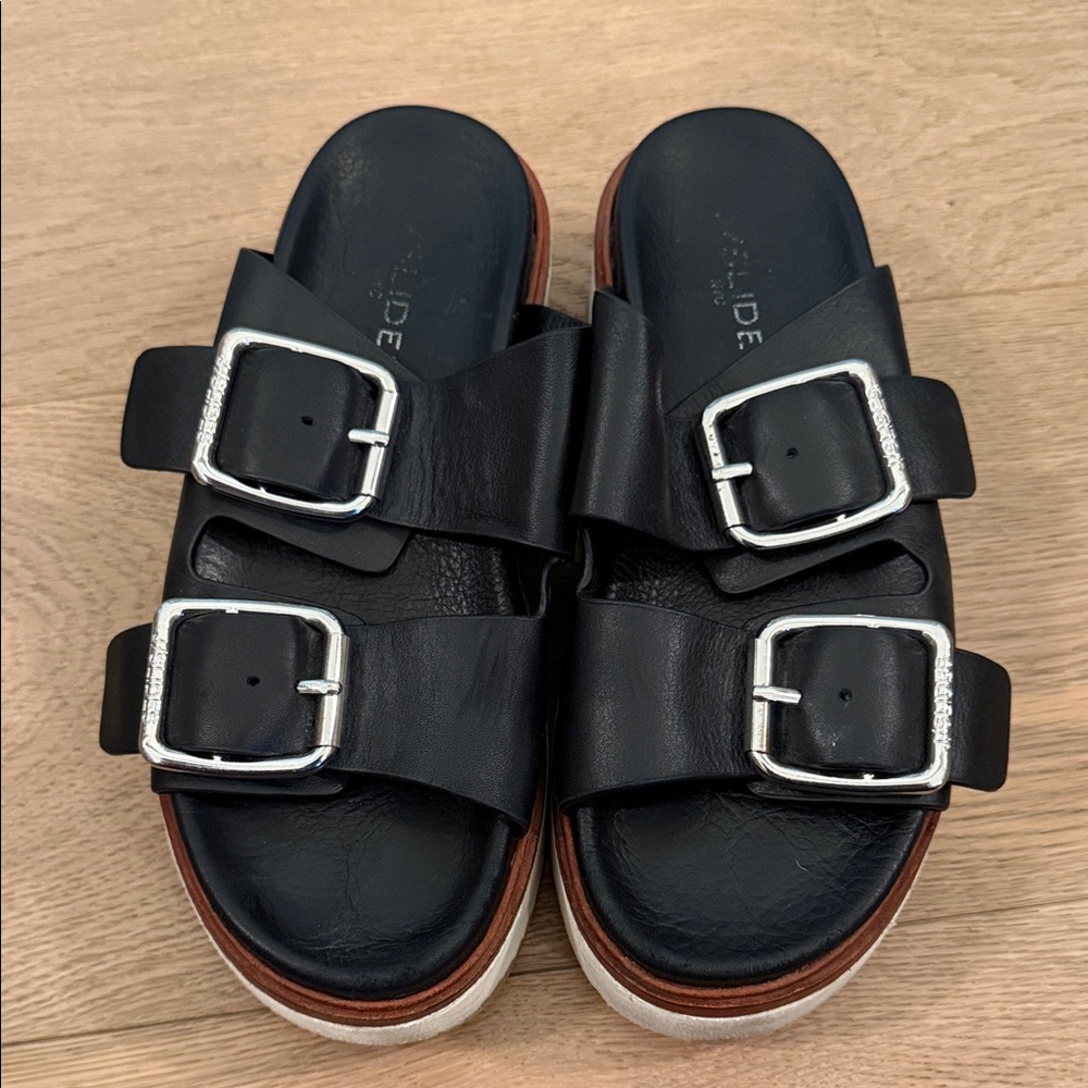 J Slides Black Sandals with Silver Buckles